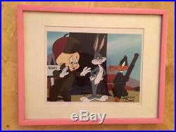 Framed Bugs Bunny, Daffy Duck, Elmer Fudd cel animation art signed Chuck Jones