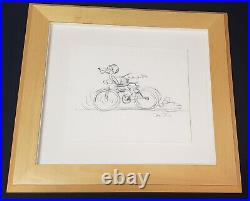 Framed Chuck Jones Signed Original Dog Riding a Bike On Paper with COA